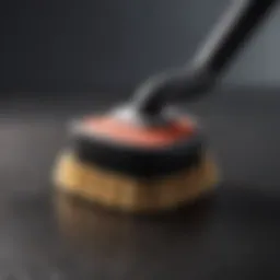 Sweepa Duo rubber brush showcasing its ergonomic design