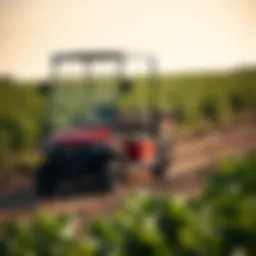 Cushman electric utility cart navigating through a farm field