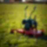 A flail mower in action on a grassy field