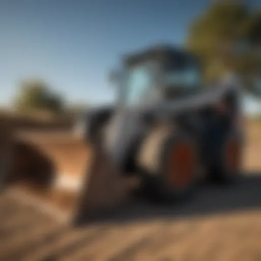 Bobcat skid steer loader with a bucket attachment during agricultural work