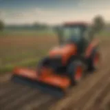 A Kubota BX Series tractor equipped with a tiller attachment in a vibrant field