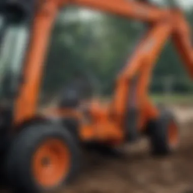 Close-up view of Kubota backhoe attachment features