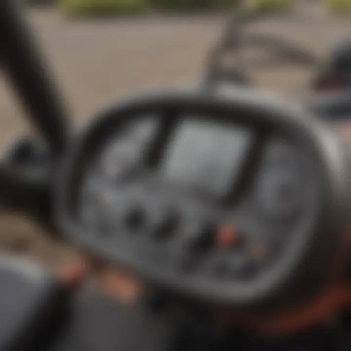 Close-up of a small riding mower's controls and dashboard, highlighting user-friendly features.