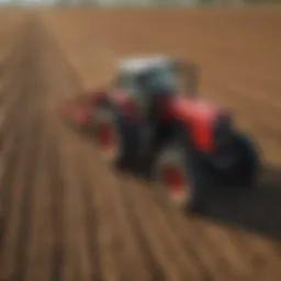 Agricultural field with a tractor equipped with GPS tracking