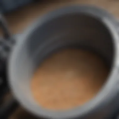 Close-up of the operational components of a grain bin unloading auger