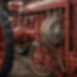 A close-up view of a vintage tractor showcasing its intricate design and mechanics