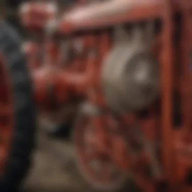A close-up view of a vintage tractor showcasing its intricate design and mechanics