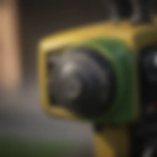 Close-up view of a John Deere lawn tractor safety switch.